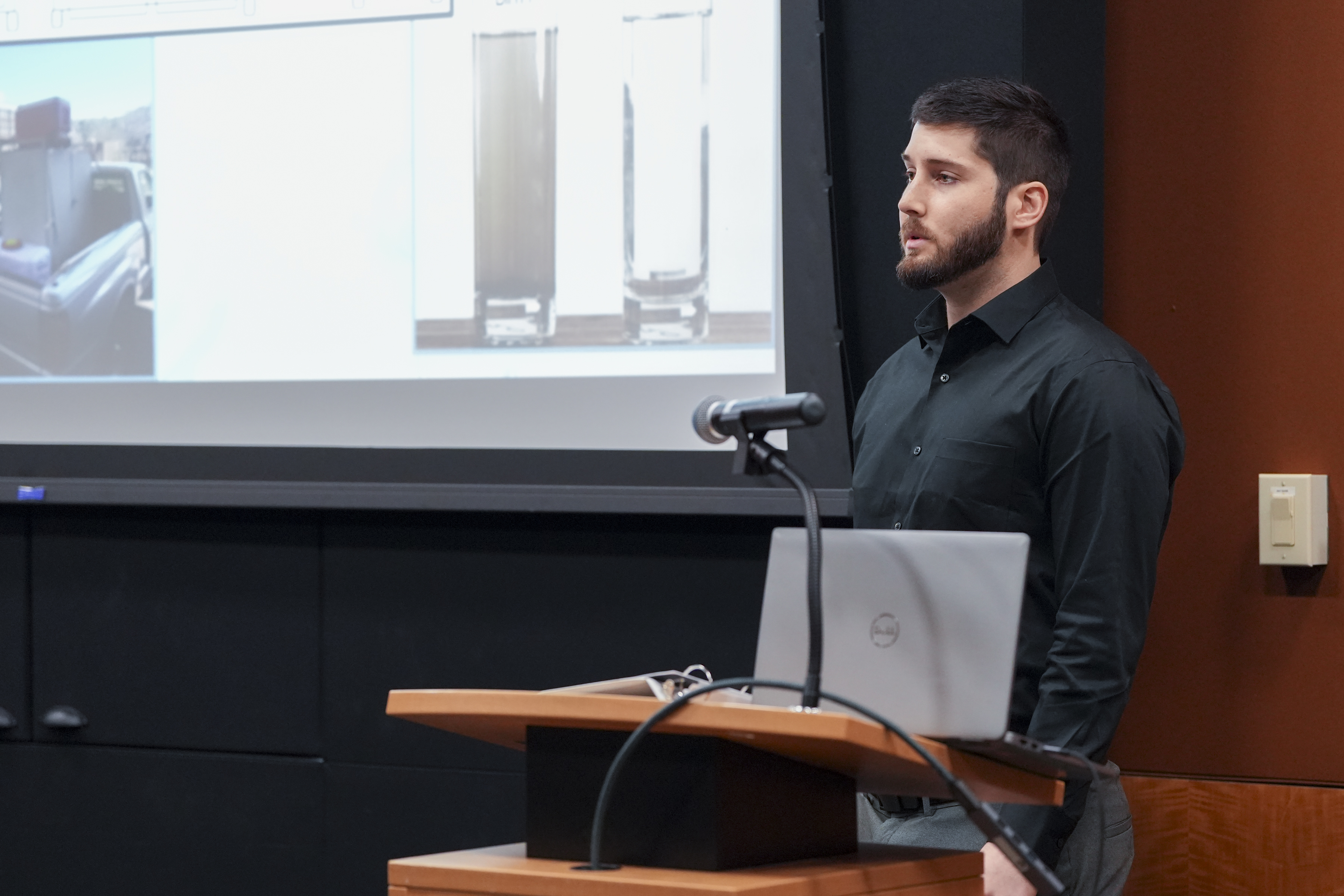 Bradley Del Vecchio delivers his speech during the 3MT Finals.